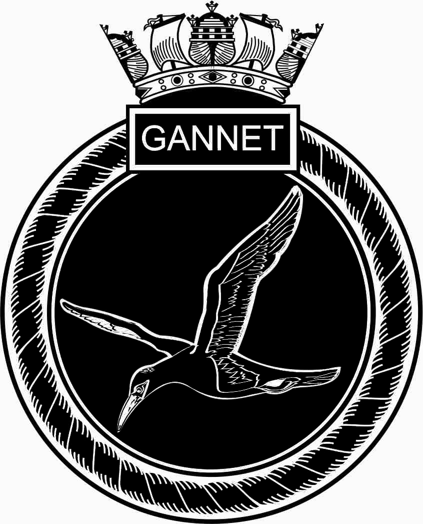 HMS Gannet's crest is made up by a circle of rope with a box above containing the word Gannet. The middle of the crest has the sea bird the Gannet on it. Above the box is a ships crown.
